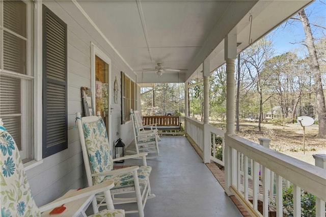 exterior space featuring a porch and ceiling fan