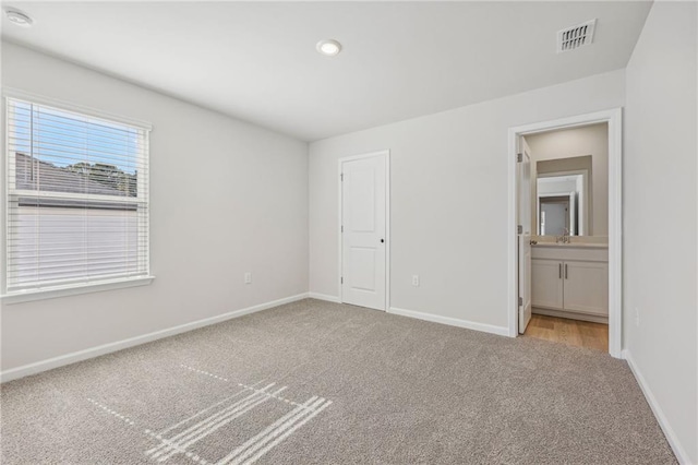 1539 High Falls Ln, Grayson, GA 30017 - unfurnished bedroom featuring carpet flooring, ensuite bath, and recessed lighting