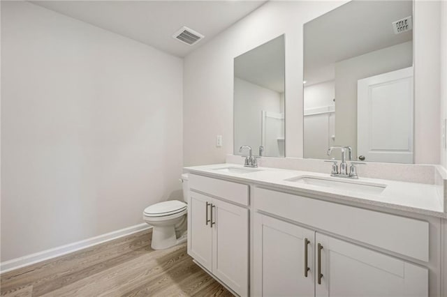 1539 High Falls Ln, Grayson, GA 30017 - full bath with double vanity and wood finished floors