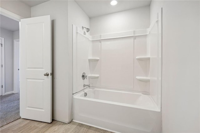 1539 High Falls Ln, Grayson, GA 30017 - bathroom with bathtub / shower combination, wood finished floors, and recessed lighting