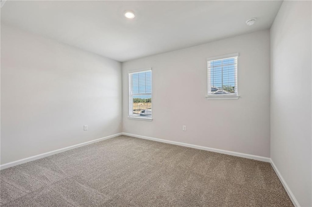1539 High Falls Ln, Grayson, GA 30017 - carpeted spare room featuring baseboards and recessed lighting