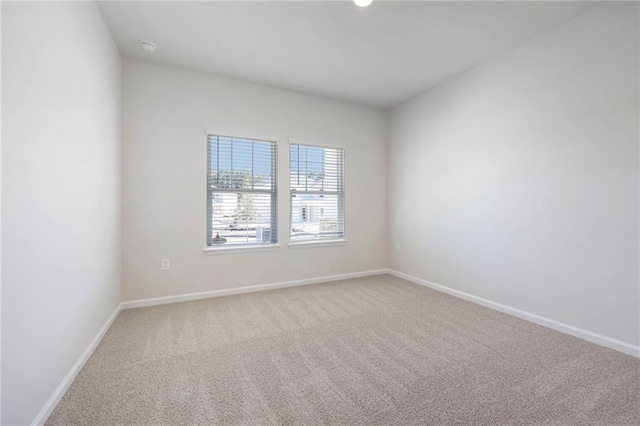 1539 High Falls Ln, Grayson, GA 30017 - unfurnished room with light colored carpet and a smoke detector
