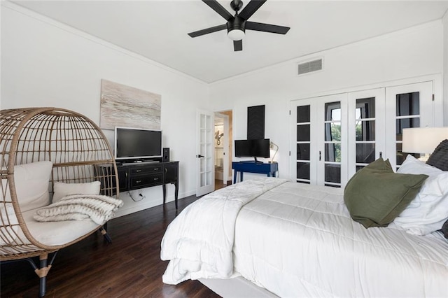 bedroom with french doors, crown molding, wood finished floors, and ceiling fan