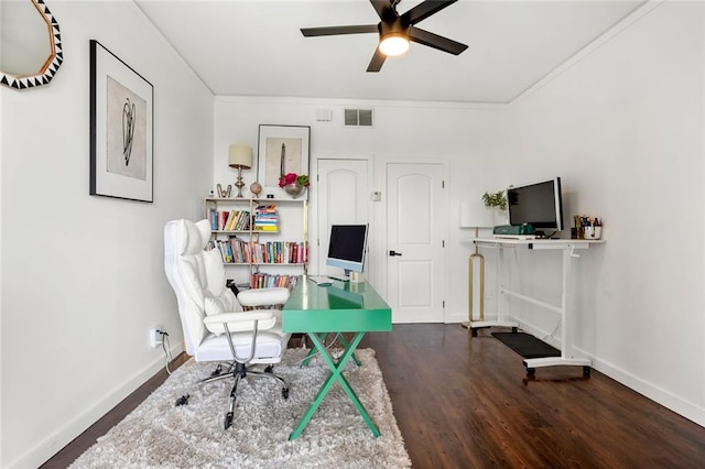 office area with baseboards, a ceiling fan, wood finished floors, and crown molding