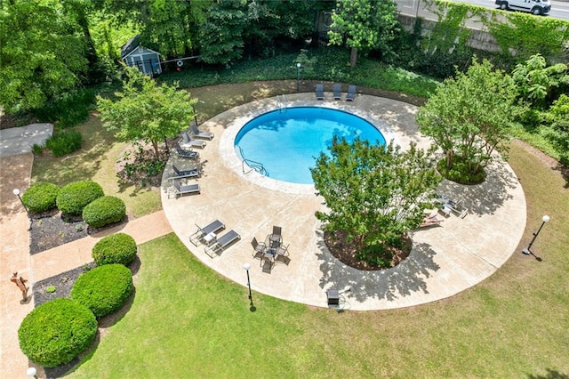 community pool with a lawn