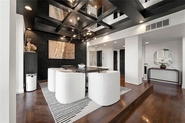 reception area featuring coffered ceiling, a chandelier, recessed lighting, and beam ceiling