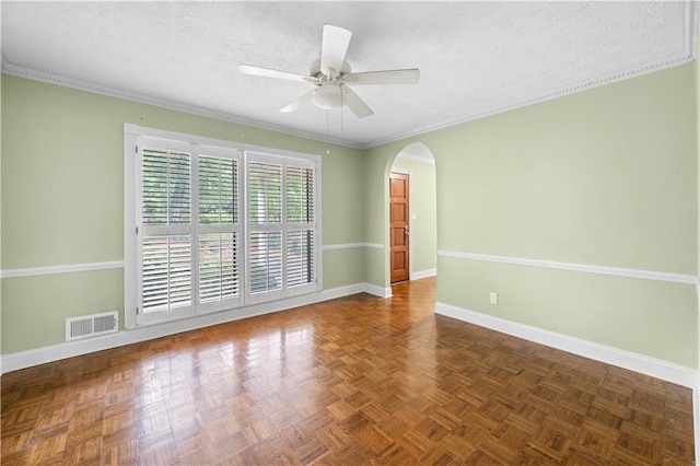 5065 Nesbit Ferry Ln, Atlanta, GA 30350 - empty room featuring arched walkways, ceiling fan, a textured ceiling, and ornamental molding