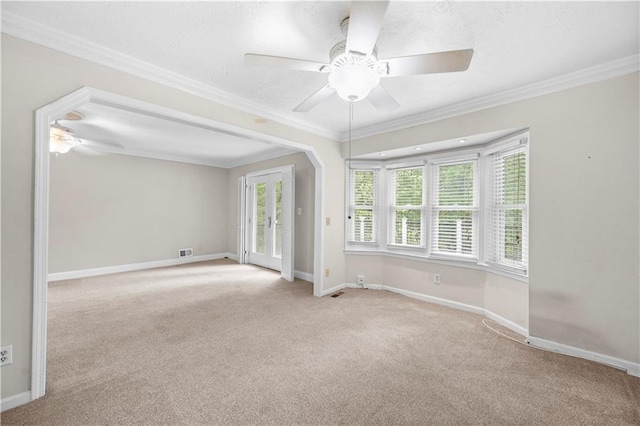 5065 Nesbit Ferry Ln, Atlanta, GA 30350 - carpeted empty room with ceiling fan, ornamental molding, and a textured ceiling