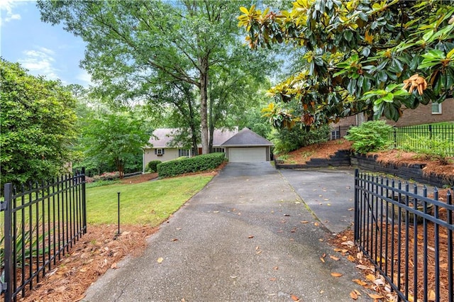5065 Nesbit Ferry Ln, Atlanta, GA 30350 - obstructed view of property with a detached garage
