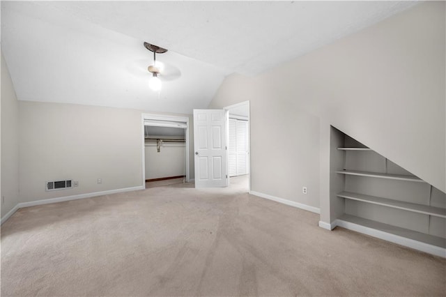 5065 Nesbit Ferry Ln, Atlanta, GA 30350 - bonus room with vaulted ceiling, carpet, and built in features