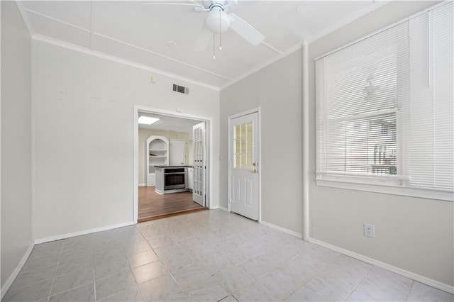 5065 Nesbit Ferry Ln, Atlanta, GA 30350 - empty room featuring ornamental molding, a ceiling fan, and light tile patterned floors