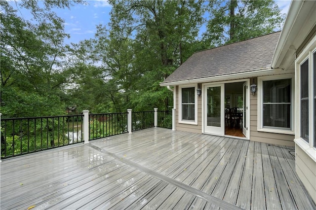 5065 Nesbit Ferry Ln, Atlanta, GA 30350 - wooden deck with view of scattered trees