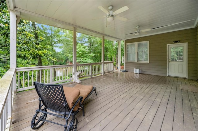 5065 Nesbit Ferry Ln, Atlanta, GA 30350 - wooden terrace featuring ceiling fan and view of scattered trees