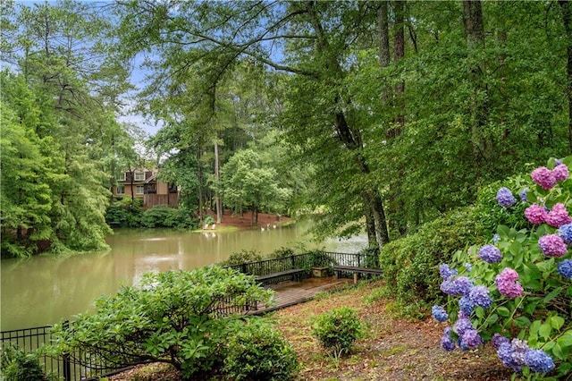 5065 Nesbit Ferry Ln, Atlanta, GA 30350 - view of yard featuring a deck with water view
