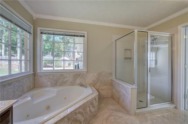 full bathroom with ornamental molding, a stall shower, a textured ceiling, vanity, and a tub with jets