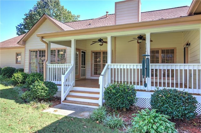 property entrance featuring a shingled roof, a chimney, and a ceiling fan