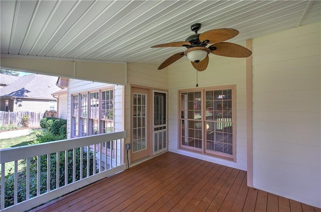 deck with fence and a ceiling fan