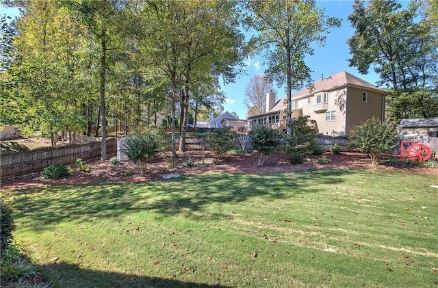 view of yard featuring fence