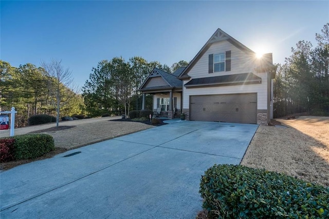 view of front of property with a garage