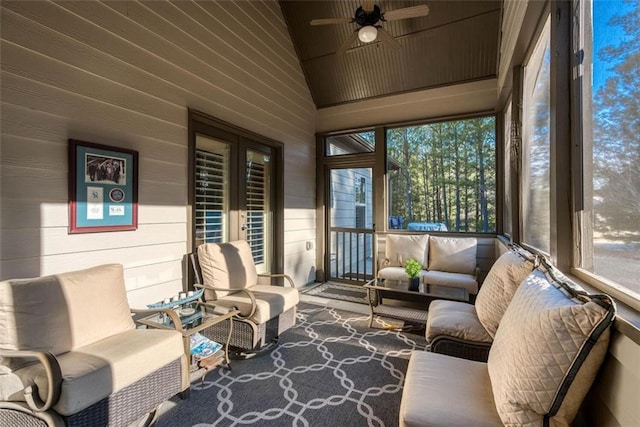 sunroom / solarium with ceiling fan