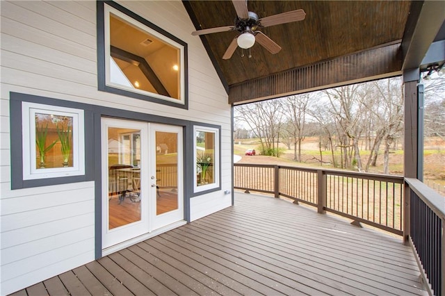 deck featuring french doors and ceiling fan