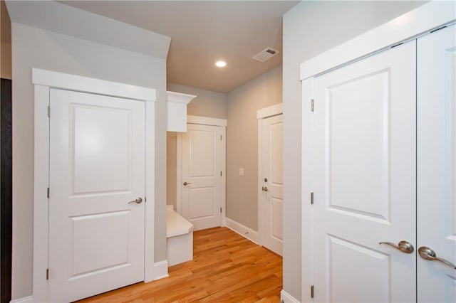 hallway featuring light hardwood / wood-style floors