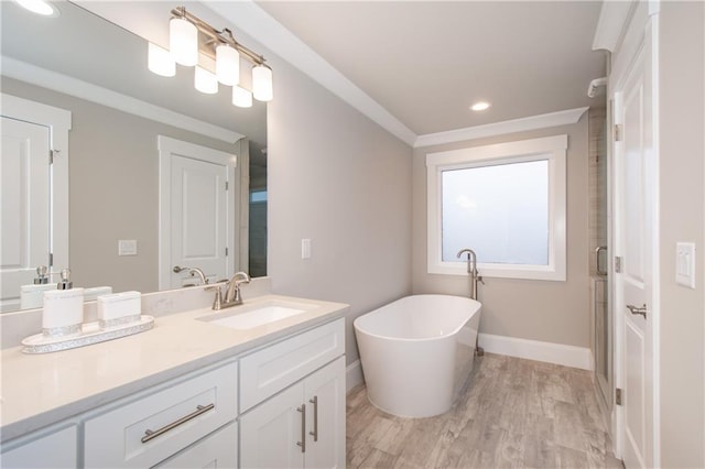 bathroom with hardwood / wood-style flooring, vanity, independent shower and bath, and crown molding