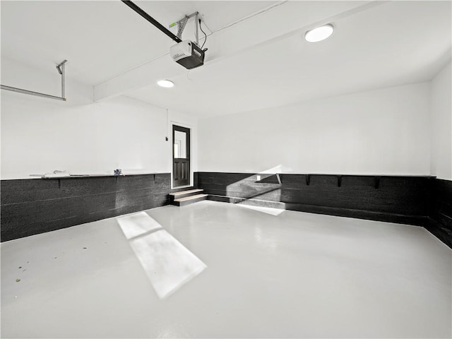 garage featuring a garage door opener