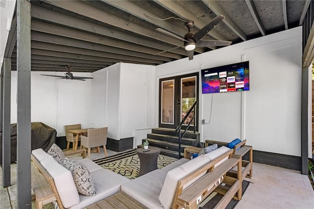 view of patio / terrace featuring an outdoor living space, entry steps, and ceiling fan