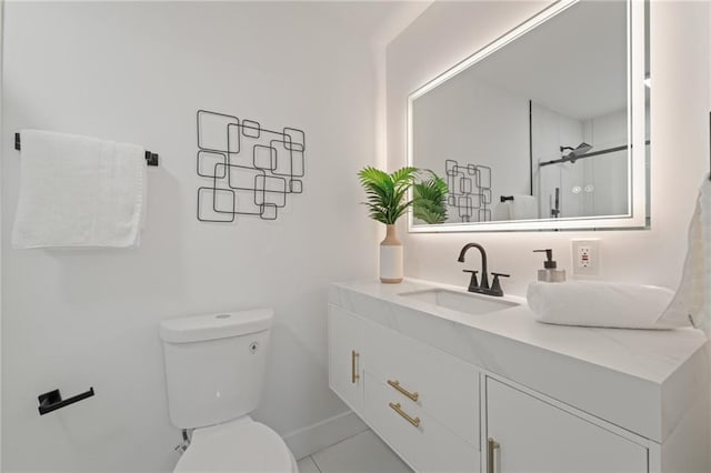 bathroom with a shower with door, vanity, tile patterned flooring, and toilet