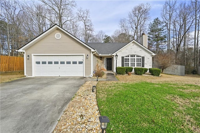 single story home with a garage, a chimney, aphalt driveway, fence, and a front yard