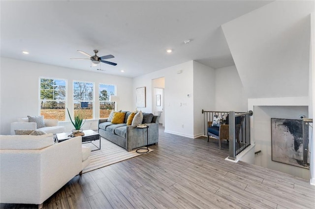 6121 Wayburn St, Tucker, GA 30084 - living room featuring a ceiling fan, wood finished floors, and recessed lighting