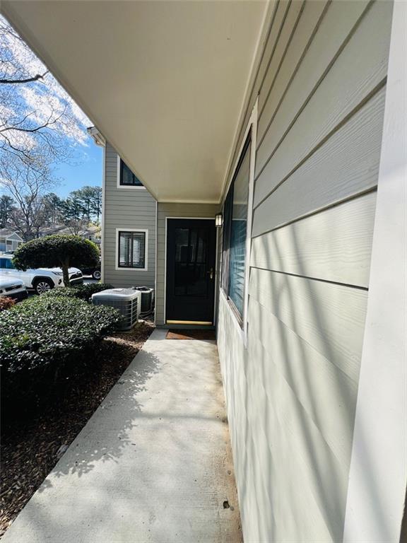 property entrance featuring central AC