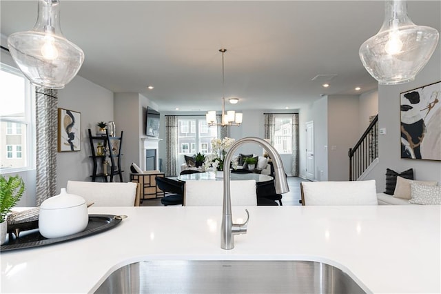 528 Aberdeen Mdw, Acworth, GA 30102 - interior details with recessed lighting, an inviting chandelier, pendant lighting, and a sink