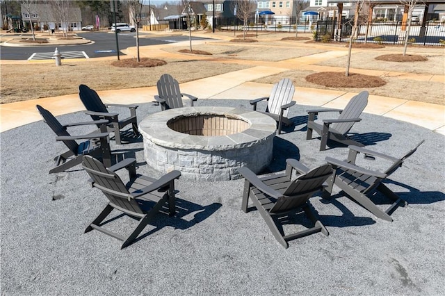 528 Aberdeen Mdw, Acworth, GA 30102 - view of patio with fence, a residential view, and an outdoor fire pit