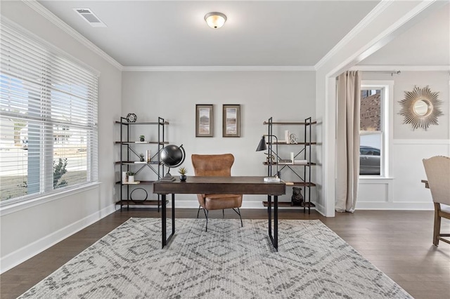 office area featuring baseboards, visible vents, dark wood-type flooring, and ornamental molding