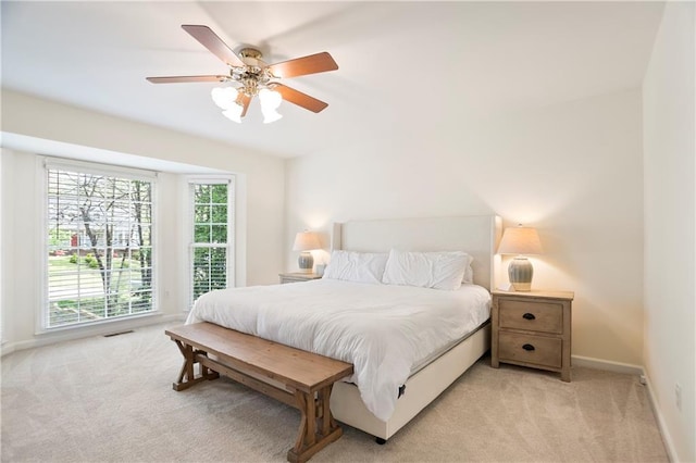 4086 Norton Pl SE, Smyrna, GA 30082 - bedroom with visible vents, baseboards, a ceiling fan, and light carpet