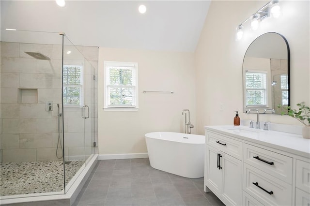 4086 Norton Pl SE, Smyrna, GA 30082 - full bathroom with plenty of natural light, a stall shower, vaulted ceiling, and vanity