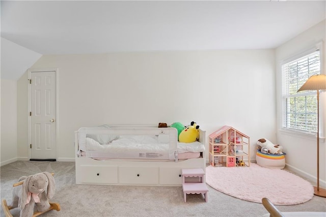 4086 Norton Pl SE, Smyrna, GA 30082 - carpeted bedroom featuring baseboards and lofted ceiling