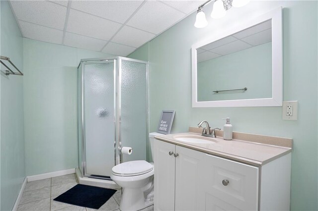4086 Norton Pl SE, Smyrna, GA 30082 - full bathroom with a shower stall, tile patterned flooring, a drop ceiling, and toilet