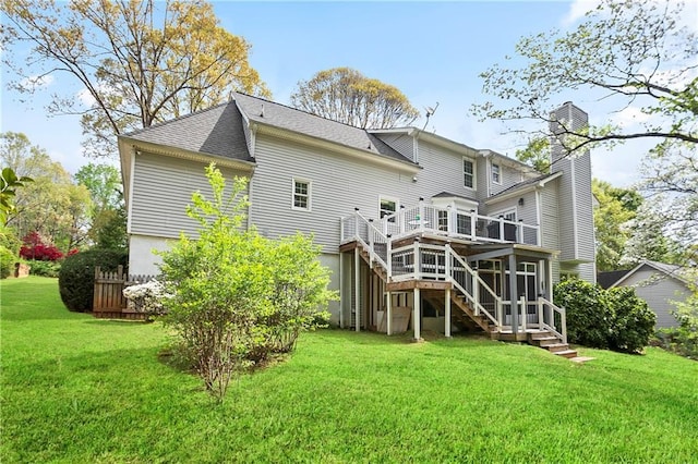 4086 Norton Pl SE, Smyrna, GA 30082 - rear view of property with a shingled roof, a deck, a yard, a chimney, and stairs