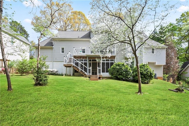 4086 Norton Pl SE, Smyrna, GA 30082 - rear view of property with stairway, a deck, a sunroom, and a lawn