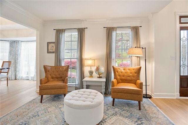4086 Norton Pl SE, Smyrna, GA 30082 - living area featuring a wealth of natural light, baseboards, crown molding, and wood finished floors