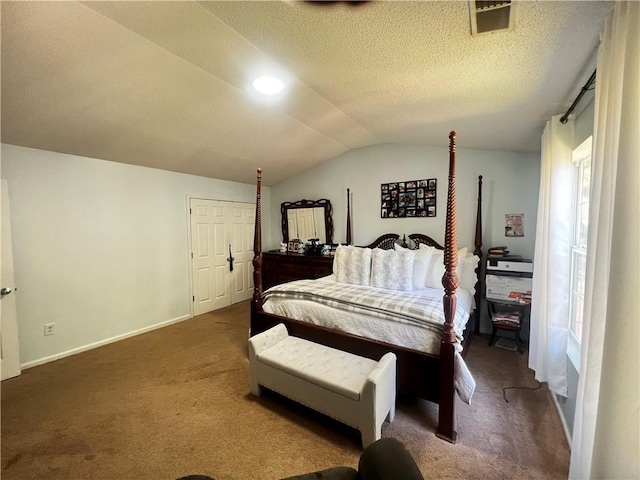 bedroom featuring carpet and vaulted ceiling