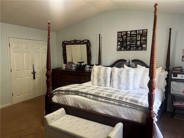 carpeted bedroom featuring a closet and vaulted ceiling