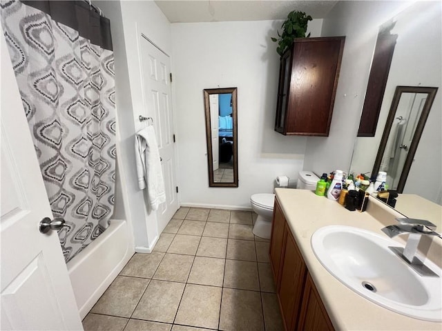 full bathroom featuring tile patterned floors, vanity, toilet, and shower / tub combo