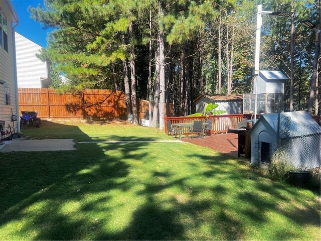 view of yard featuring a deck