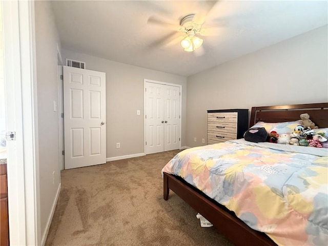 602 Summer Pl, Norcross, GA 30071 - carpeted bedroom featuring baseboards, a ceiling fan, and a closet