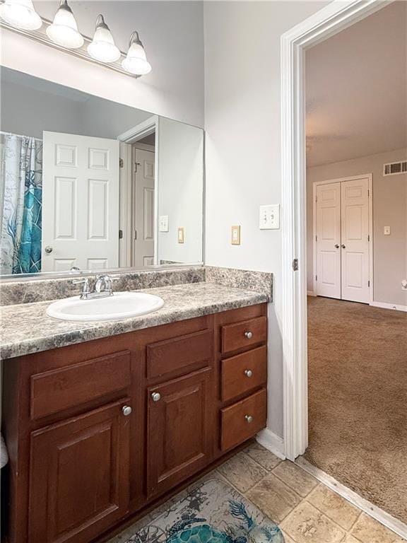 602 Summer Pl, Norcross, GA 30071 - bathroom featuring vanity and baseboards