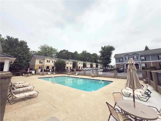 602 Summer Pl, Norcross, GA 30071 - community pool featuring a patio area
